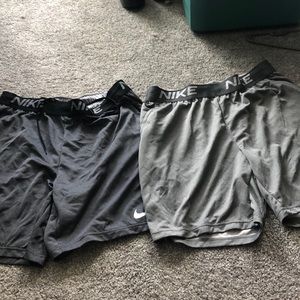 Two Nike dry fit men shorts with pockets
